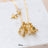 Disney x Short Story Necklace Flounder And Sebastian - Gold