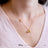 Disney x Short Story Necklace Flounder And Sebastian - Gold